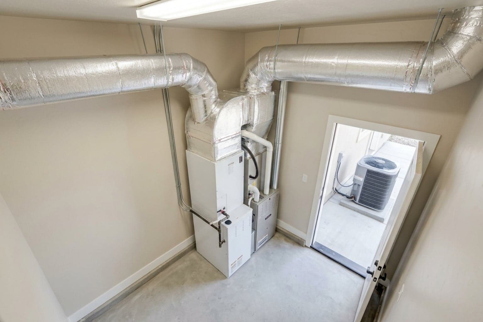 Basement air handler and ductwork prepared for a Murray, Utah central AC installation